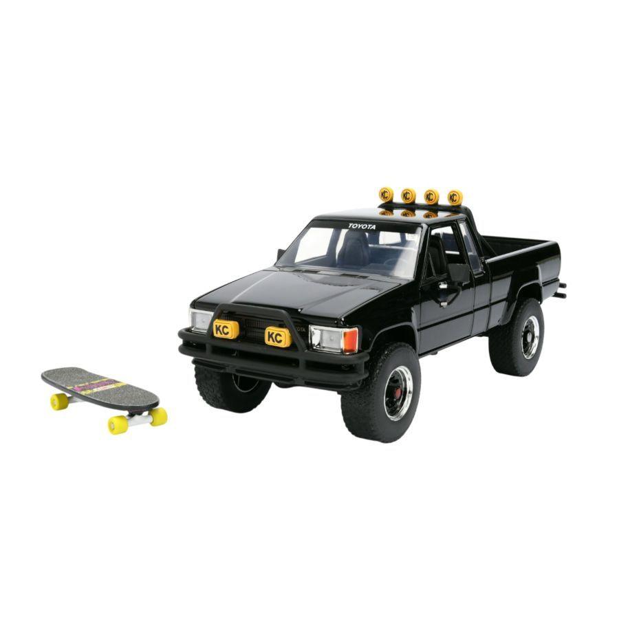 Back to the Future - 1:24 1985 Toyota SR5 Pickup Truck with Marty's Skateboard Diecast Vehicle