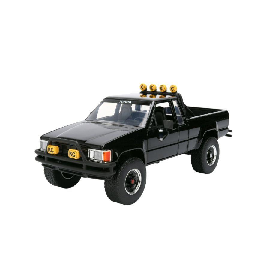 Back to the Future - 1:24 1985 Toyota SR5 Pickup Truck with Marty's Skateboard Diecast Vehicle