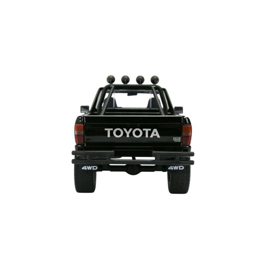 Back to the Future - 1:24 1985 Toyota SR5 Pickup Truck with Marty's Skateboard Diecast Vehicle