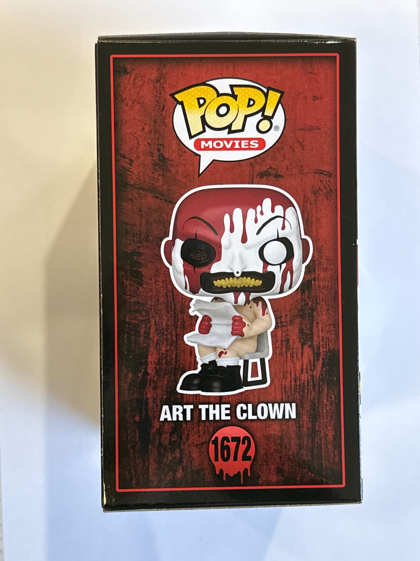 Terrifier - Art the Clown Sitting (Bloody) US Exclusive Pop! Vinyl #1672