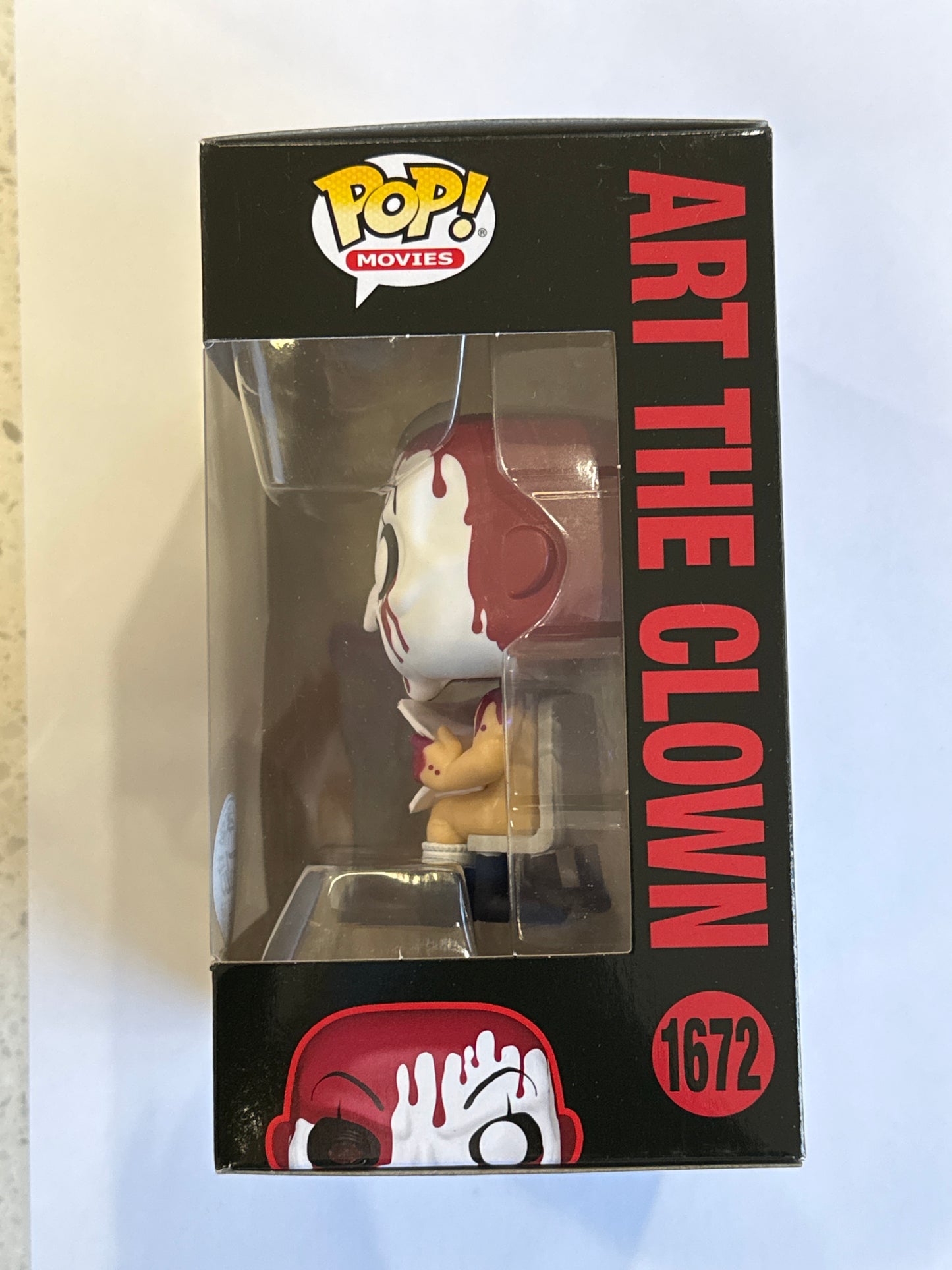 Terrifier - Art the Clown Sitting (Bloody) US Exclusive Pop! Vinyl #1672